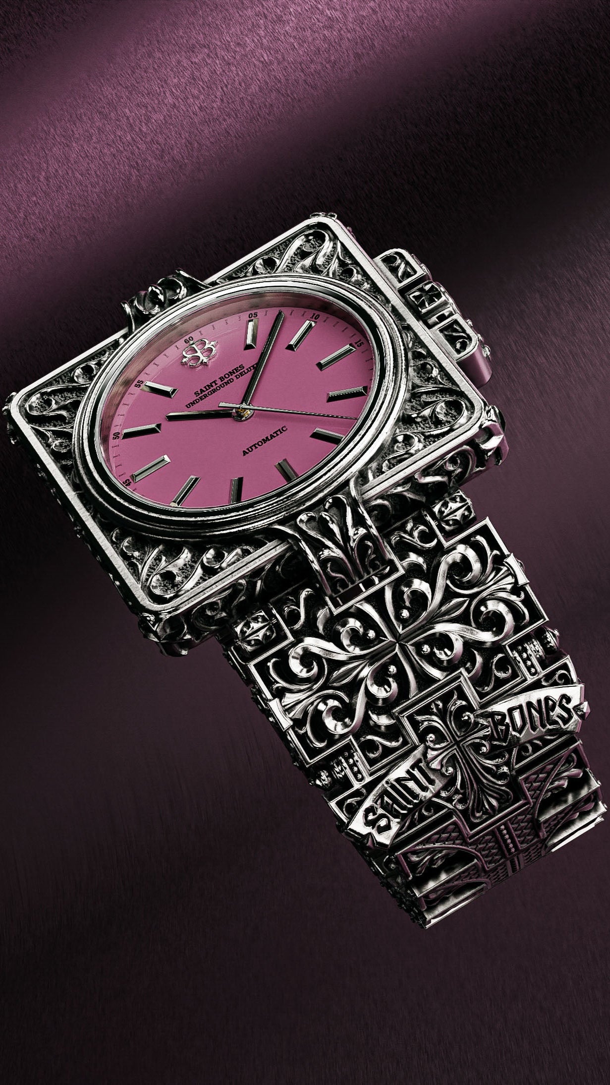 Decorative watch with pink face and intricate silver design on a dark background