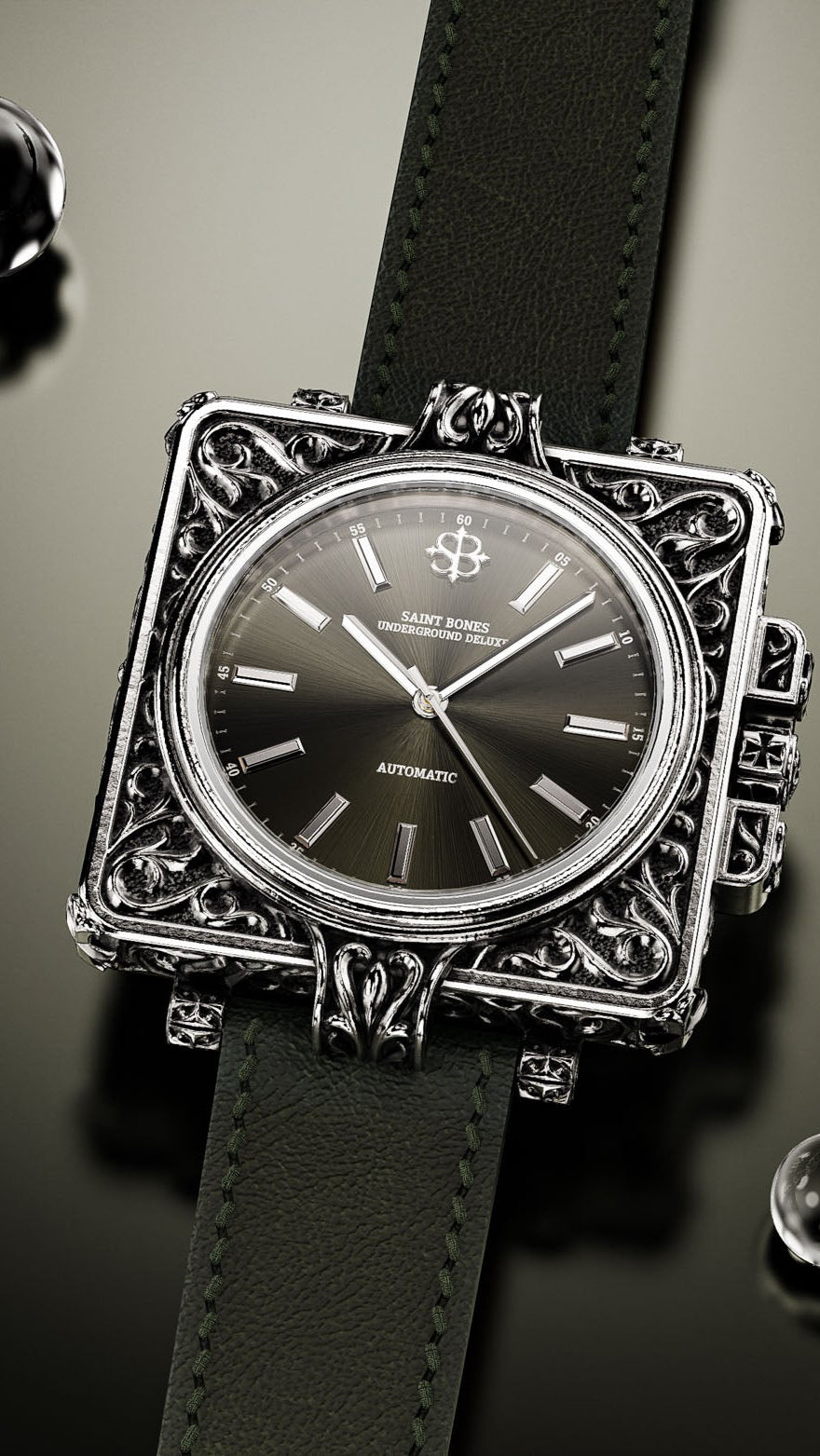 Luxury watch with decorative case and black strap on a reflective surface with water droplets.